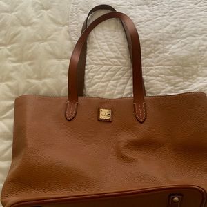 Brown Dooney &Bourke tote, red lining, barely used, holds a lot